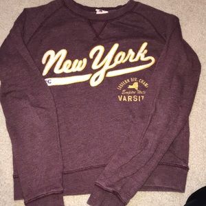 I’m selling a maroon crew neck.